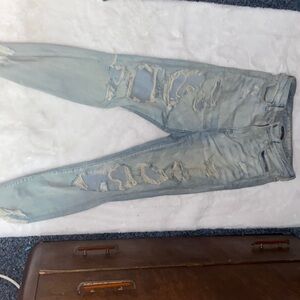 American eagle jeans, size-12, faded blue, ripped near knees